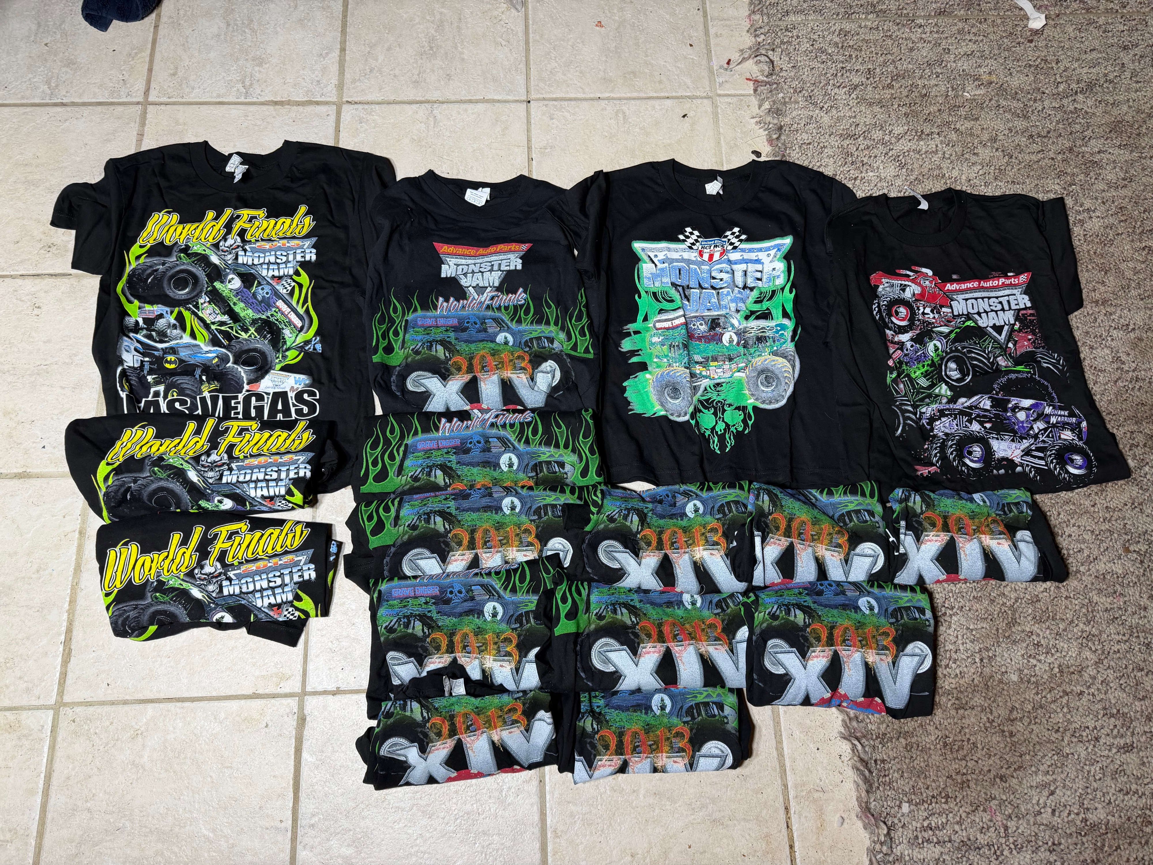 A Collection of Souvenir Event T-Shirts Featuring 2013 Monster Jam and Midwestern Music Festivals