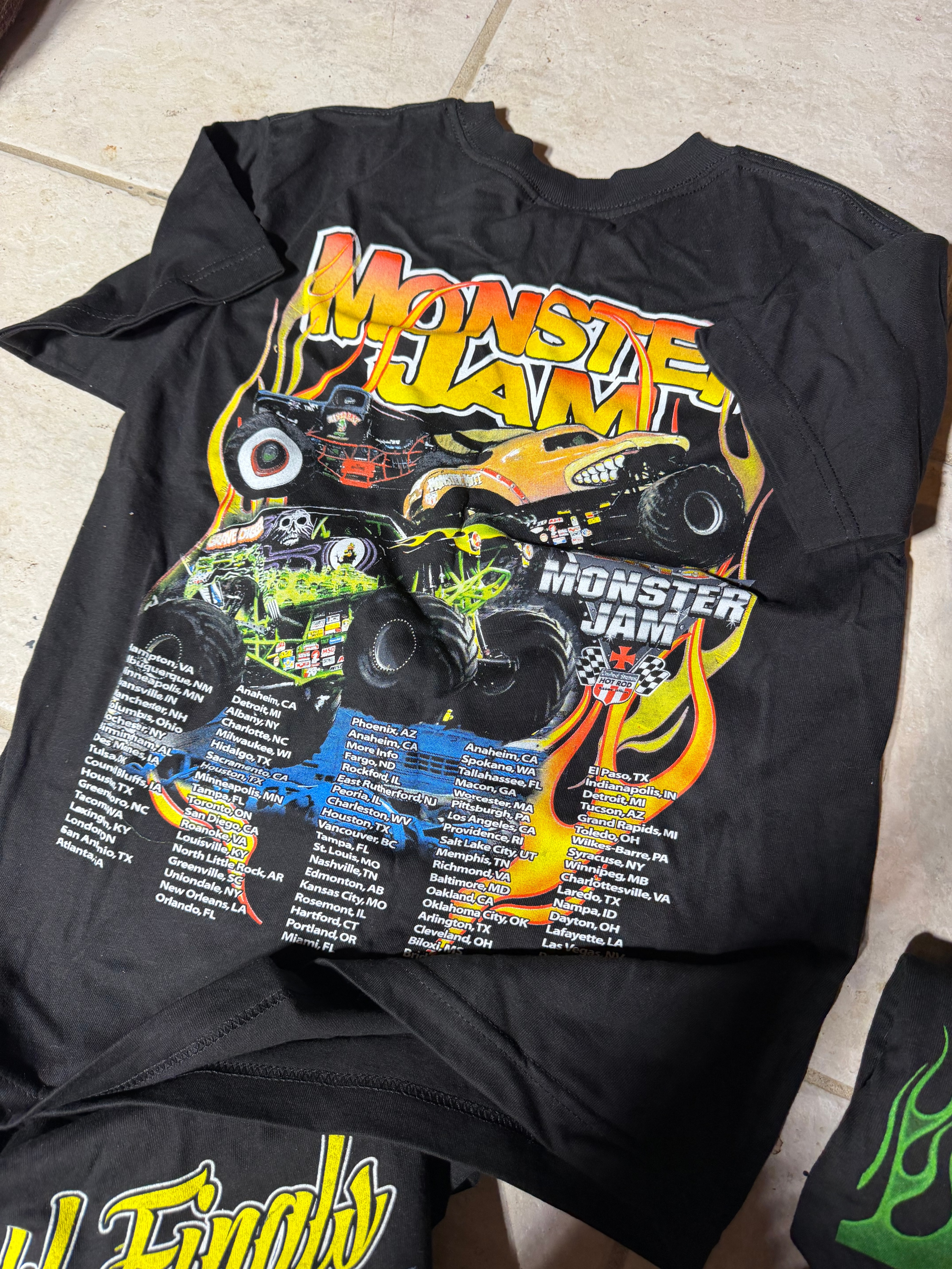 A Collection of Souvenir Event T-Shirts Featuring 2013 Monster Jam and Midwestern Music Festivals