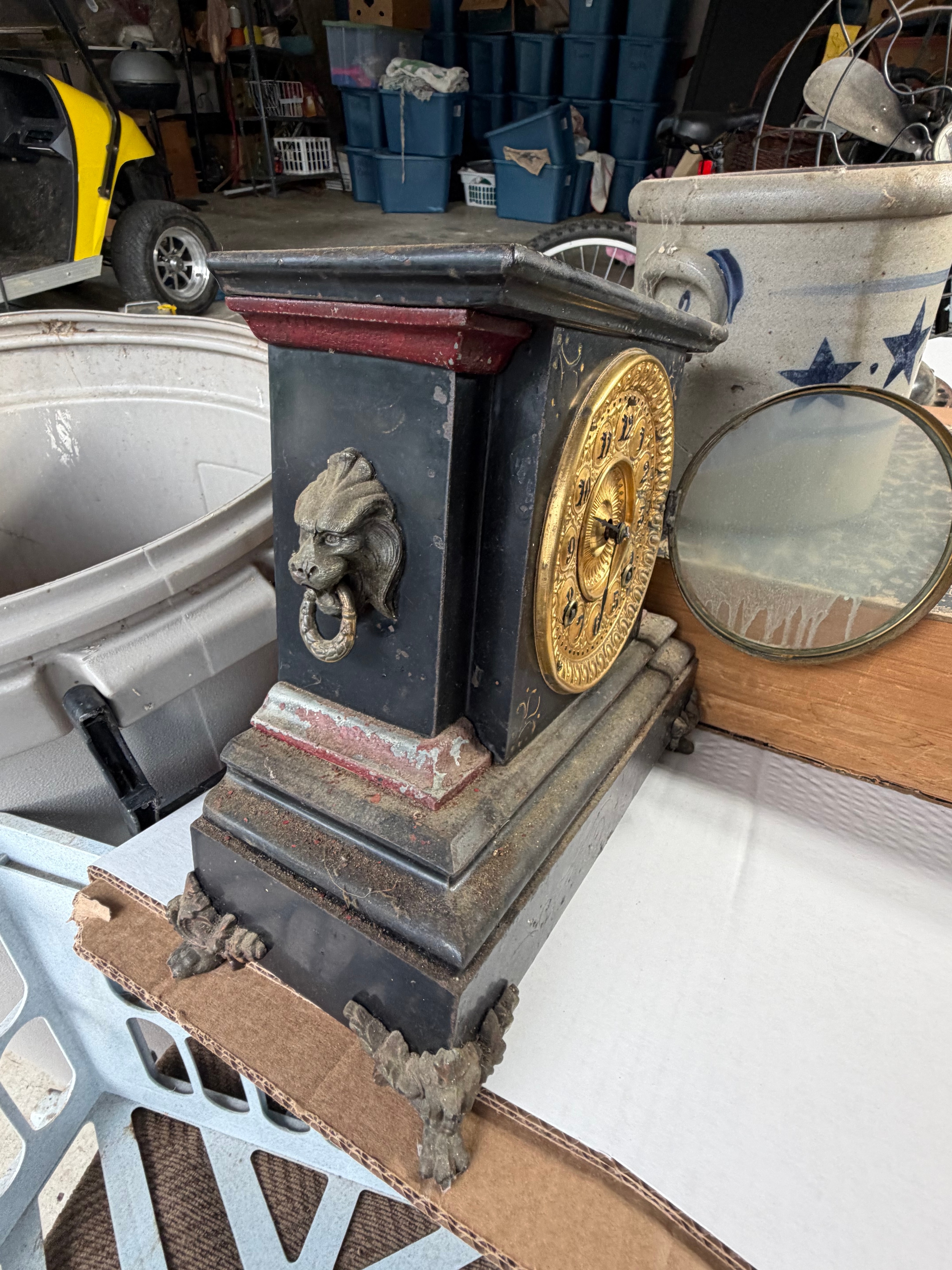 An Assortment of Antique and Vintage Items including an Ansonia Mantel Clock, Robbins and Myers Fan, and Newspaper Archive