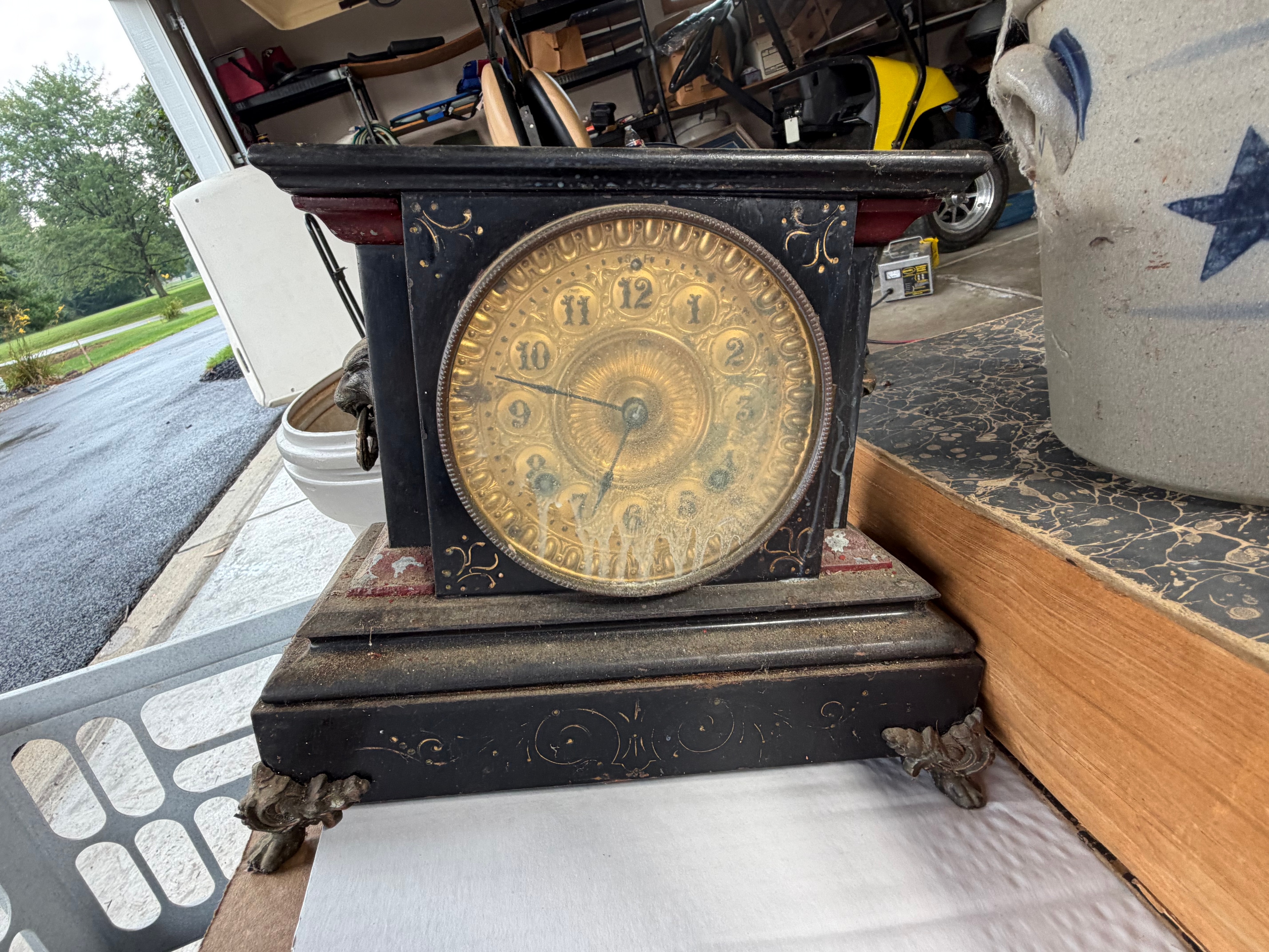 An Assortment of Antique and Vintage Items including an Ansonia Mantel Clock, Robbins and Myers Fan, and Newspaper Archive
