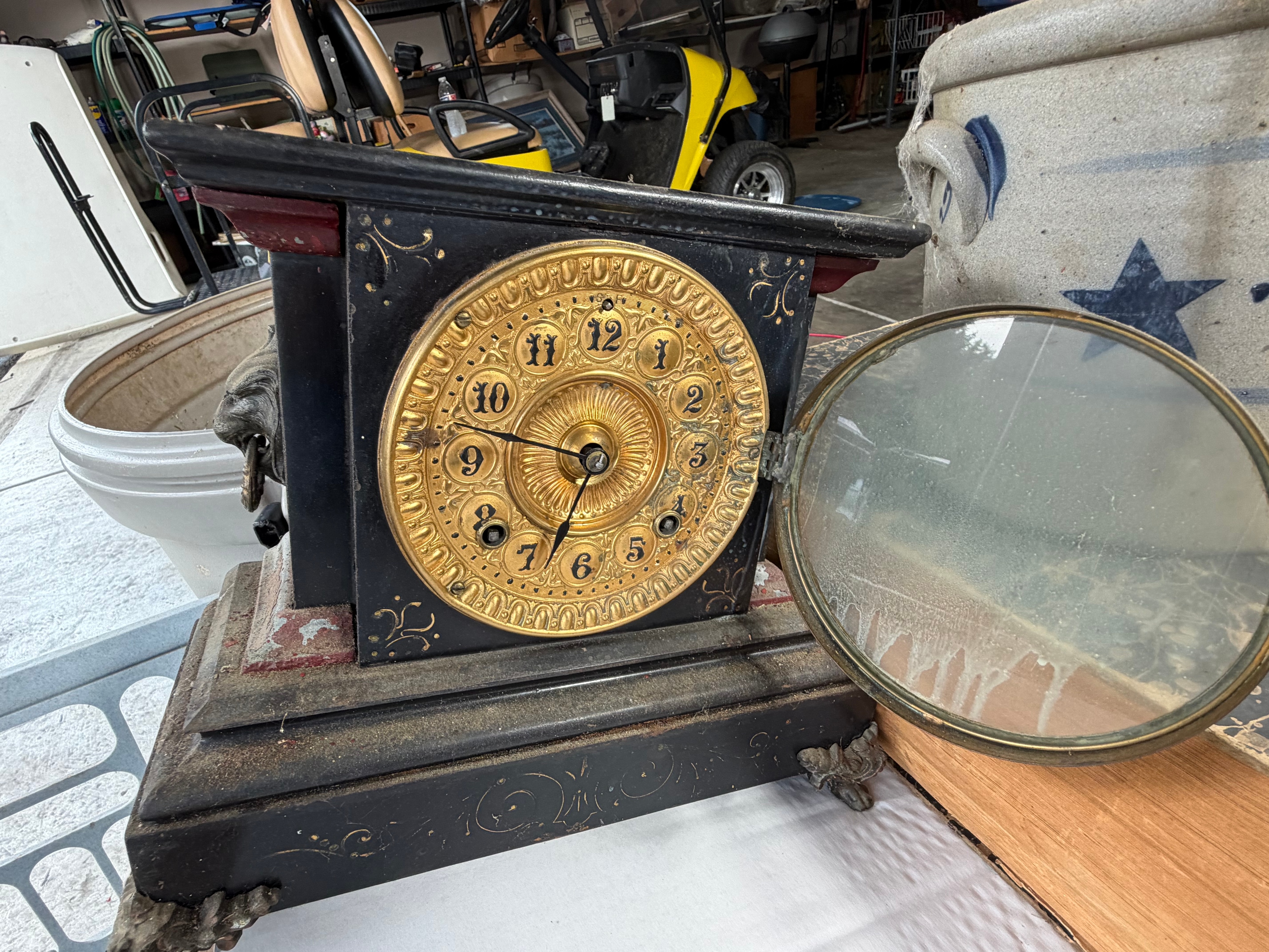 An Assortment of Antique and Vintage Items including an Ansonia Mantel Clock, Robbins and Myers Fan, and Newspaper Archive