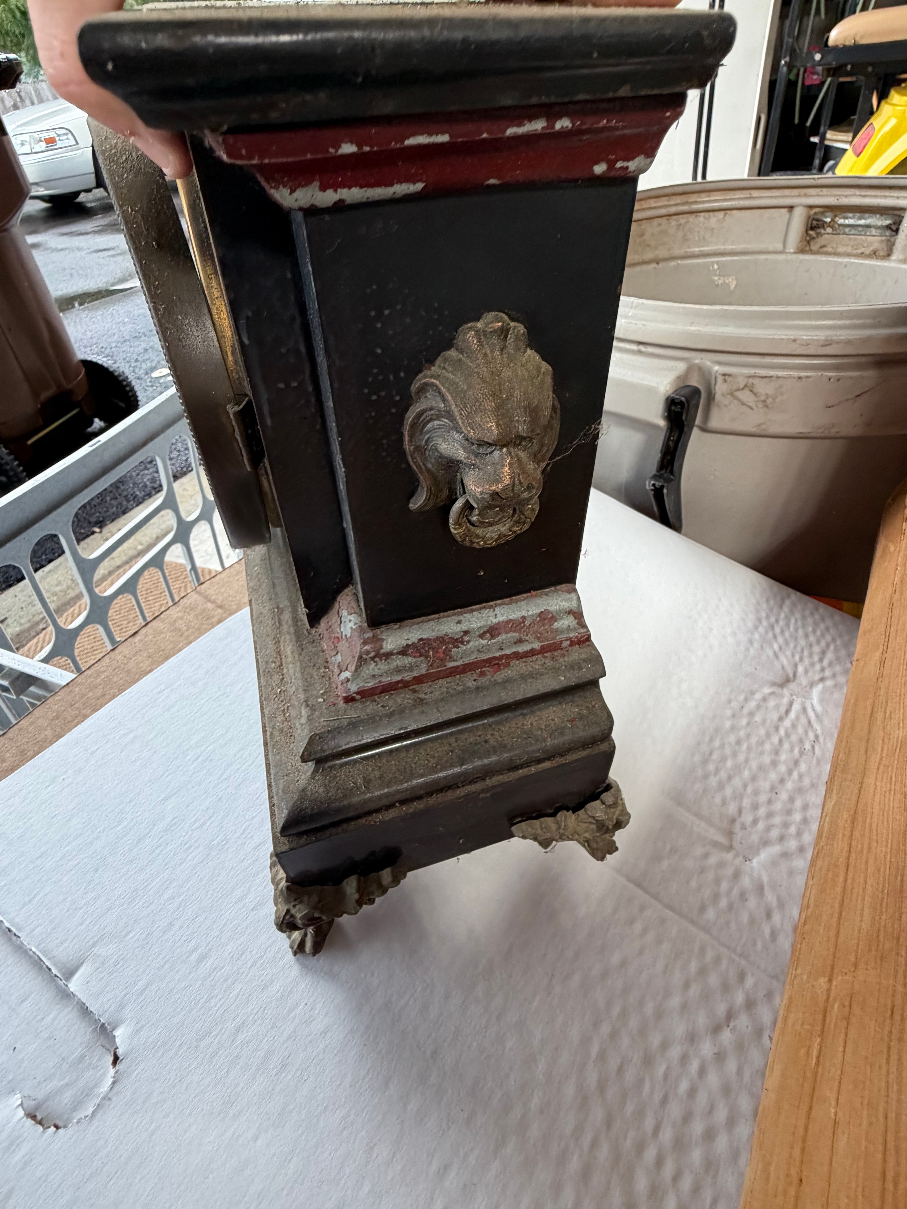 An Assortment of Antique and Vintage Items including an Ansonia Mantel Clock, Robbins and Myers Fan, and Newspaper Archive