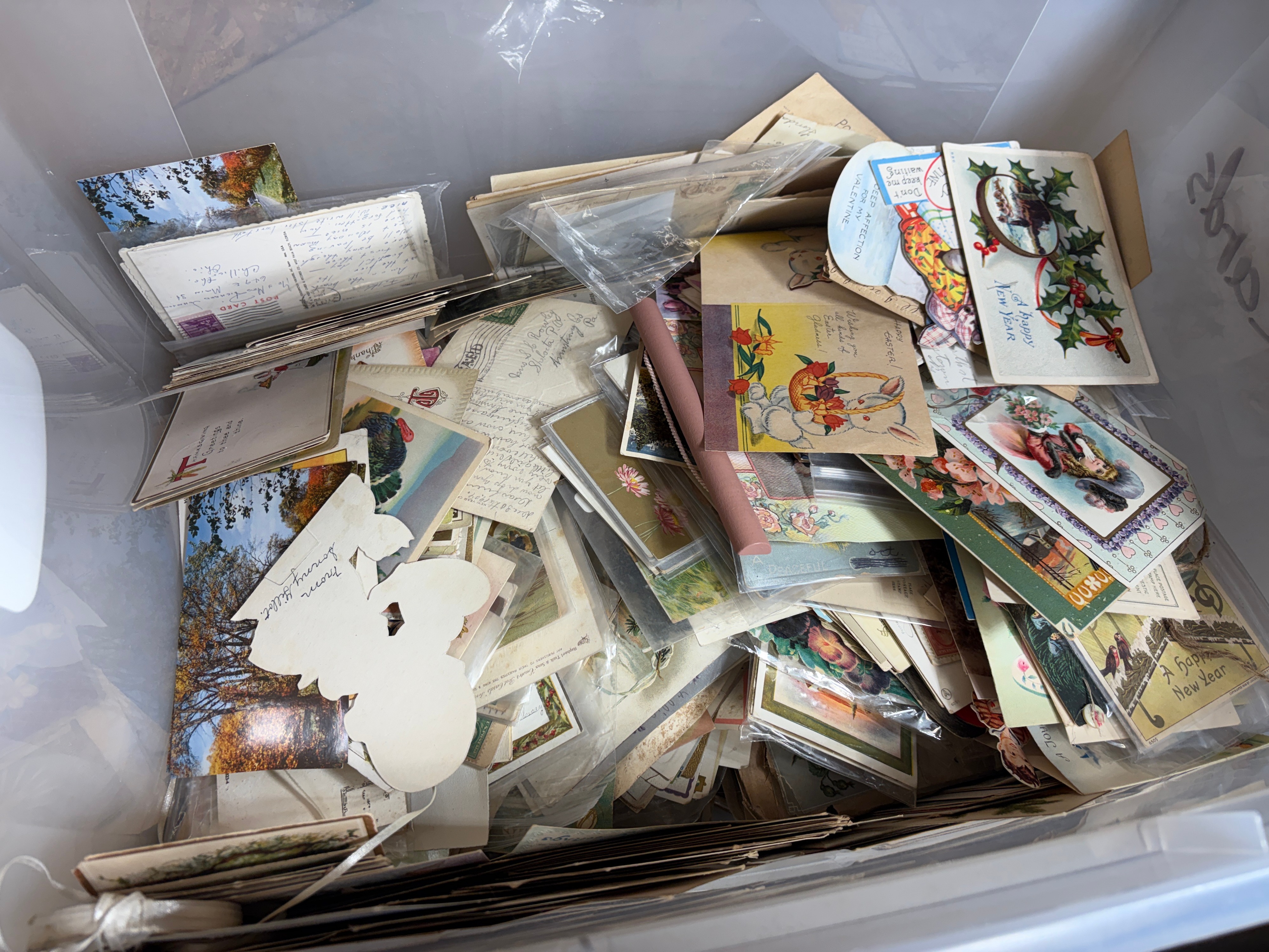 An Assortment of 21 lbs of Vintage Postcards