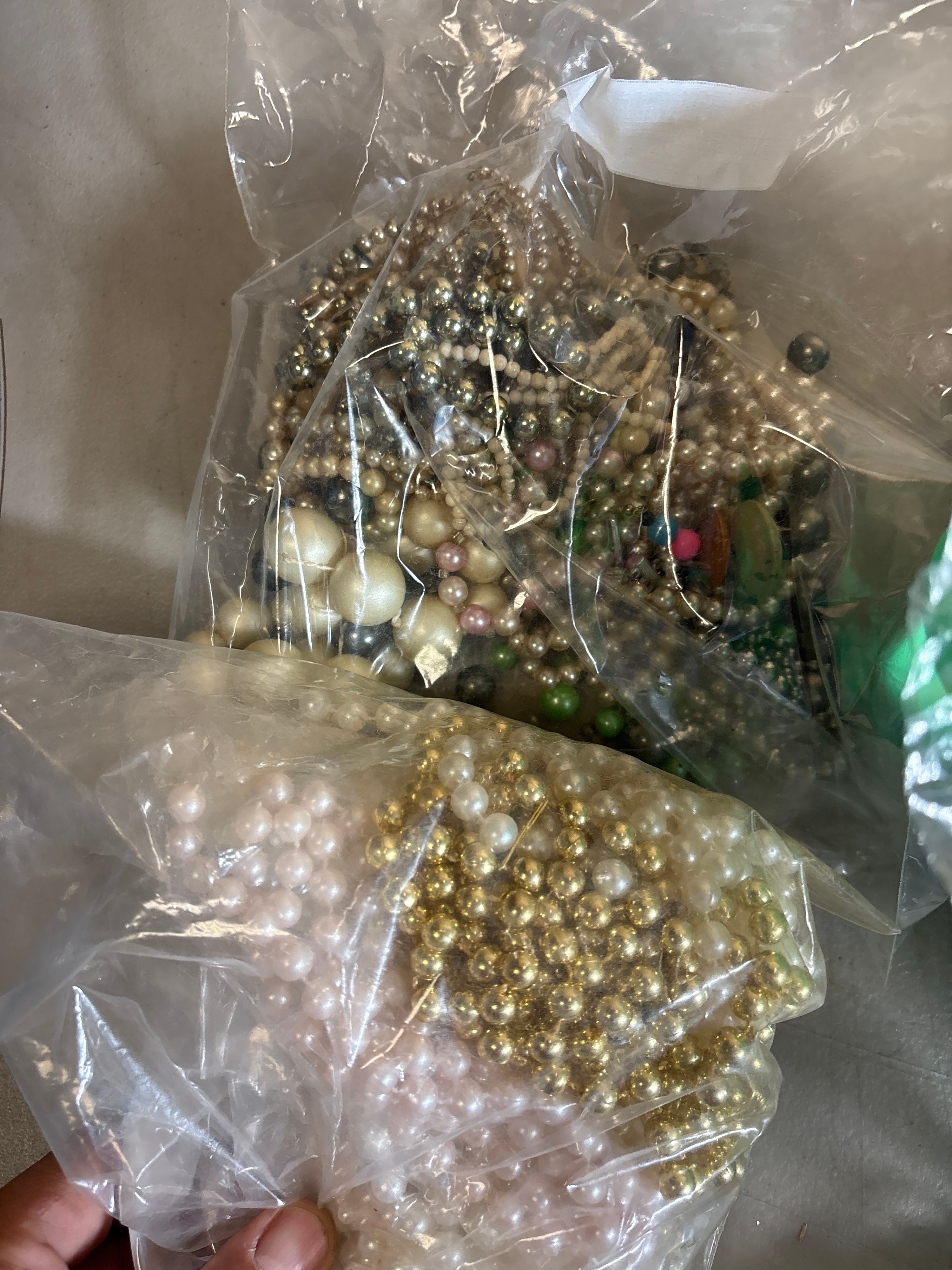 An Assortment of Vintage Costume Jewelry, Sewing Notions, Buttons, and Hardware