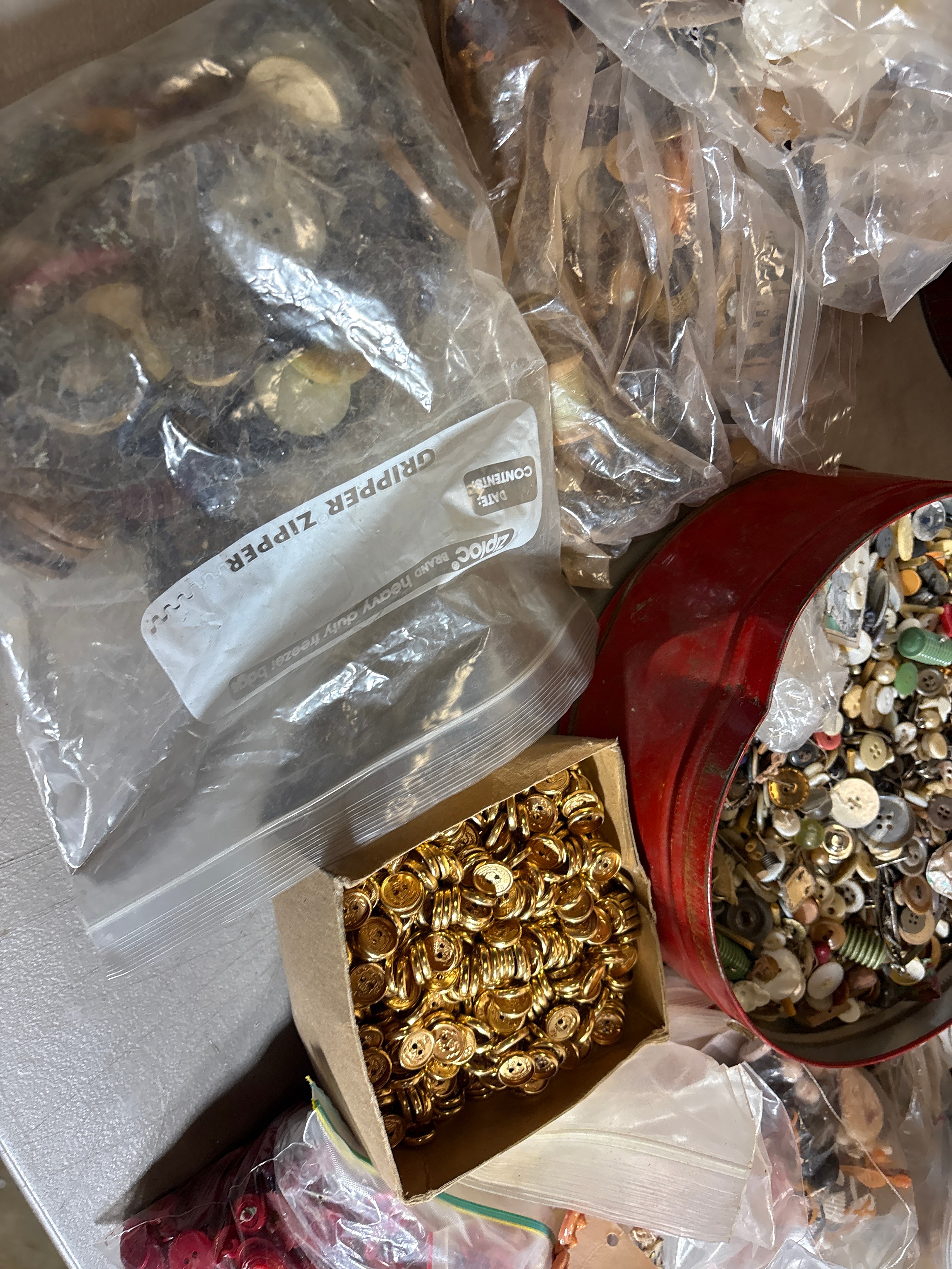 An Assortment of Approximately 84 lbs of Vintage and Contemporary Buttons and Sewing Notions