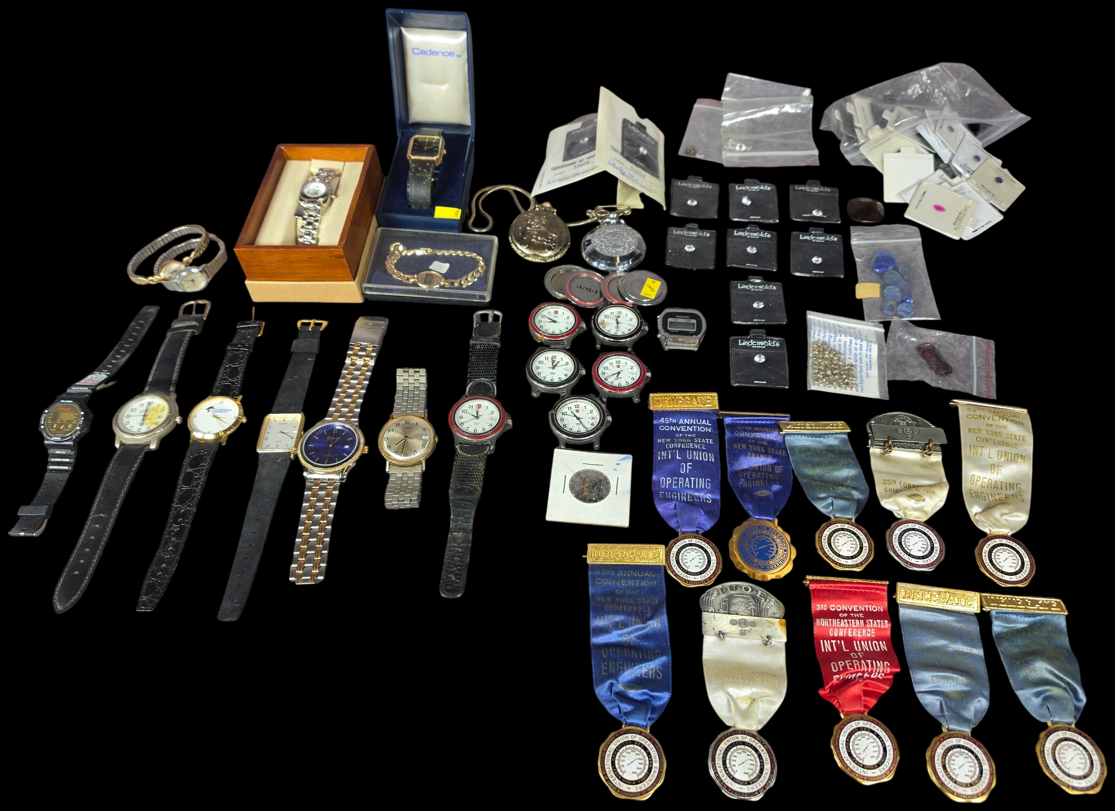 A Collection of Wristwatches, Pocket Watches, Commemorative Union Medals, and Loose Gemstones