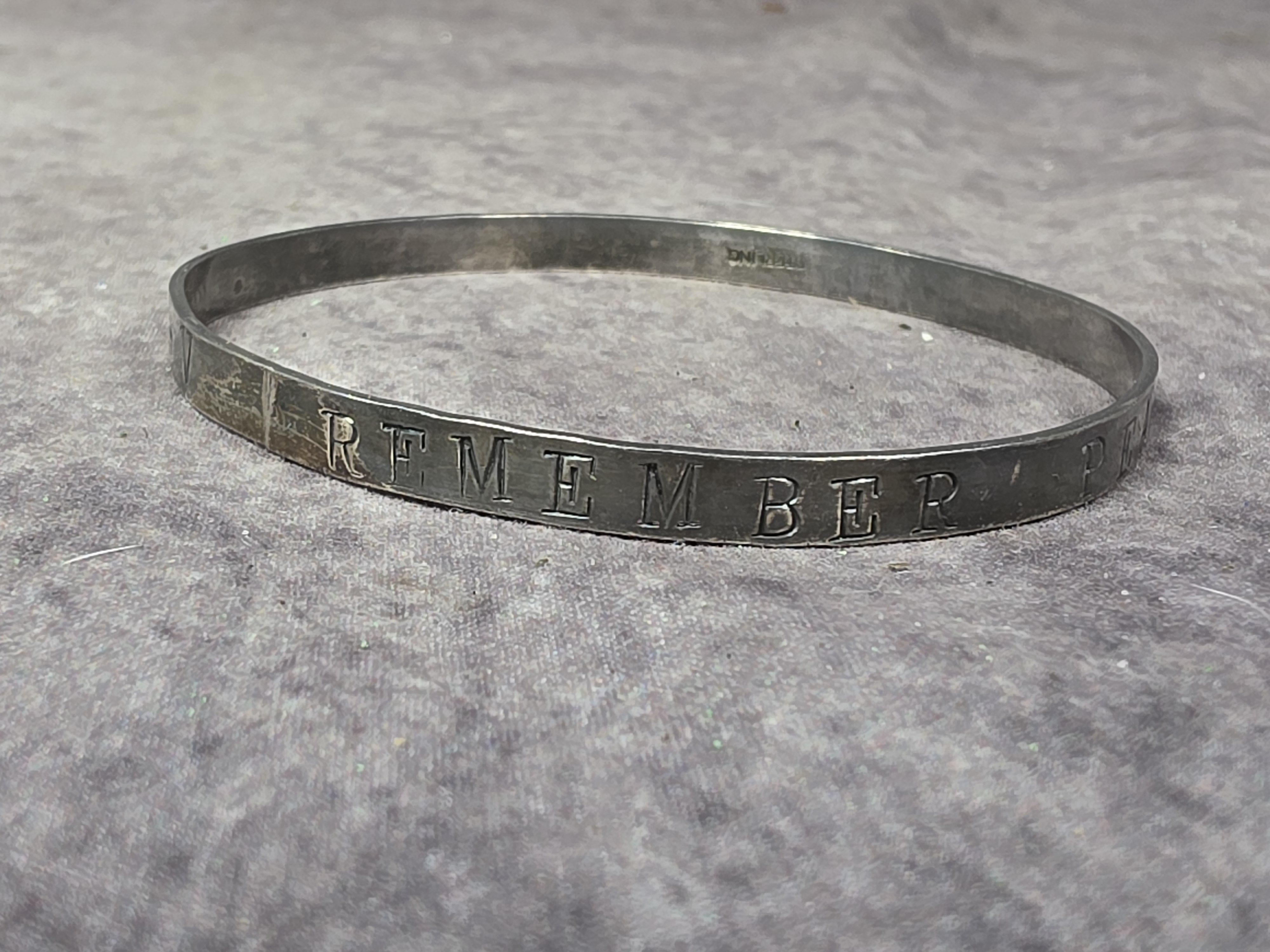 A World War II Era Sterling Silver Remember Pearl Harbor Bangle