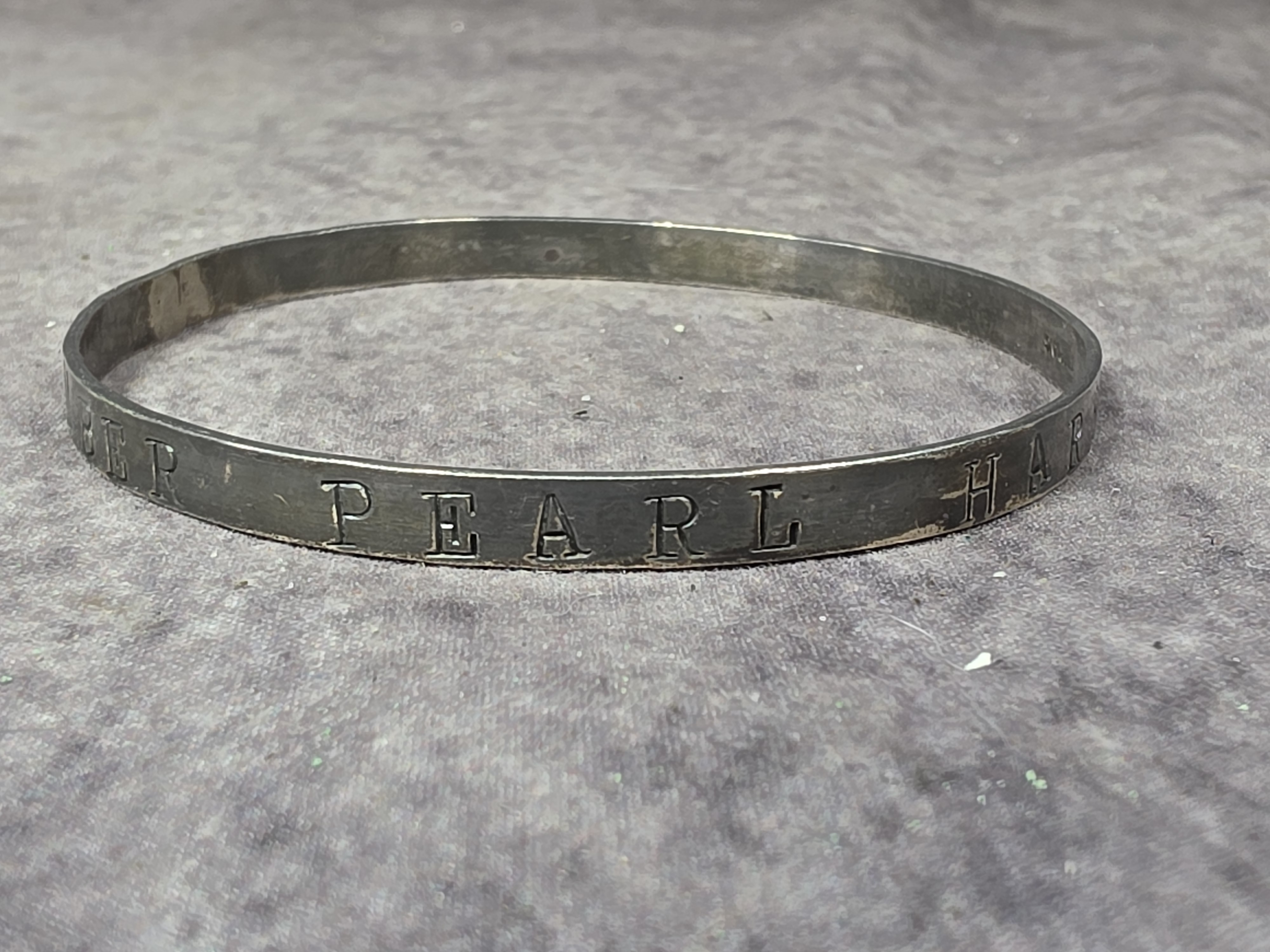 A World War II Era Sterling Silver Remember Pearl Harbor Bangle