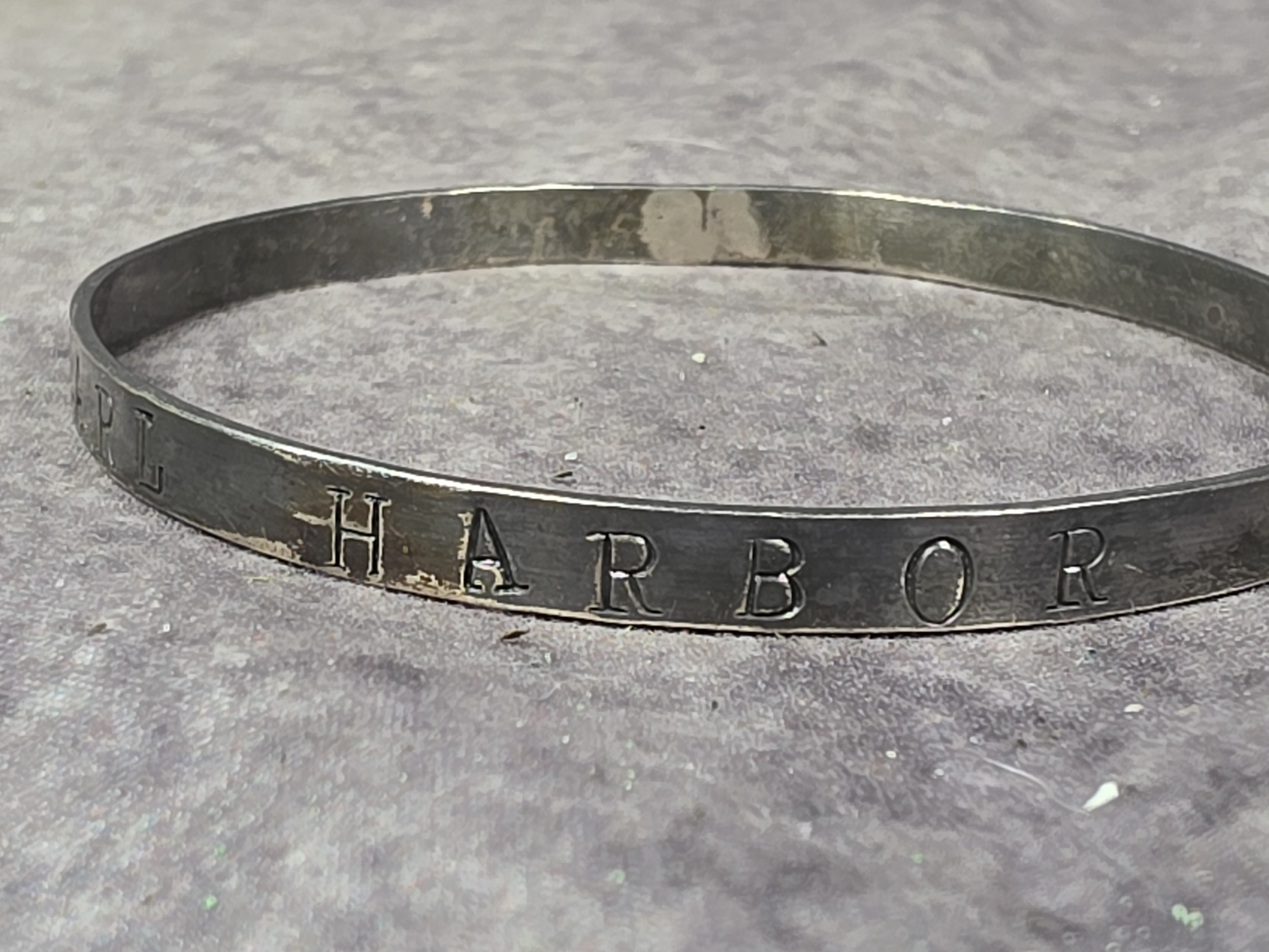 A World War II Era Sterling Silver Remember Pearl Harbor Bangle