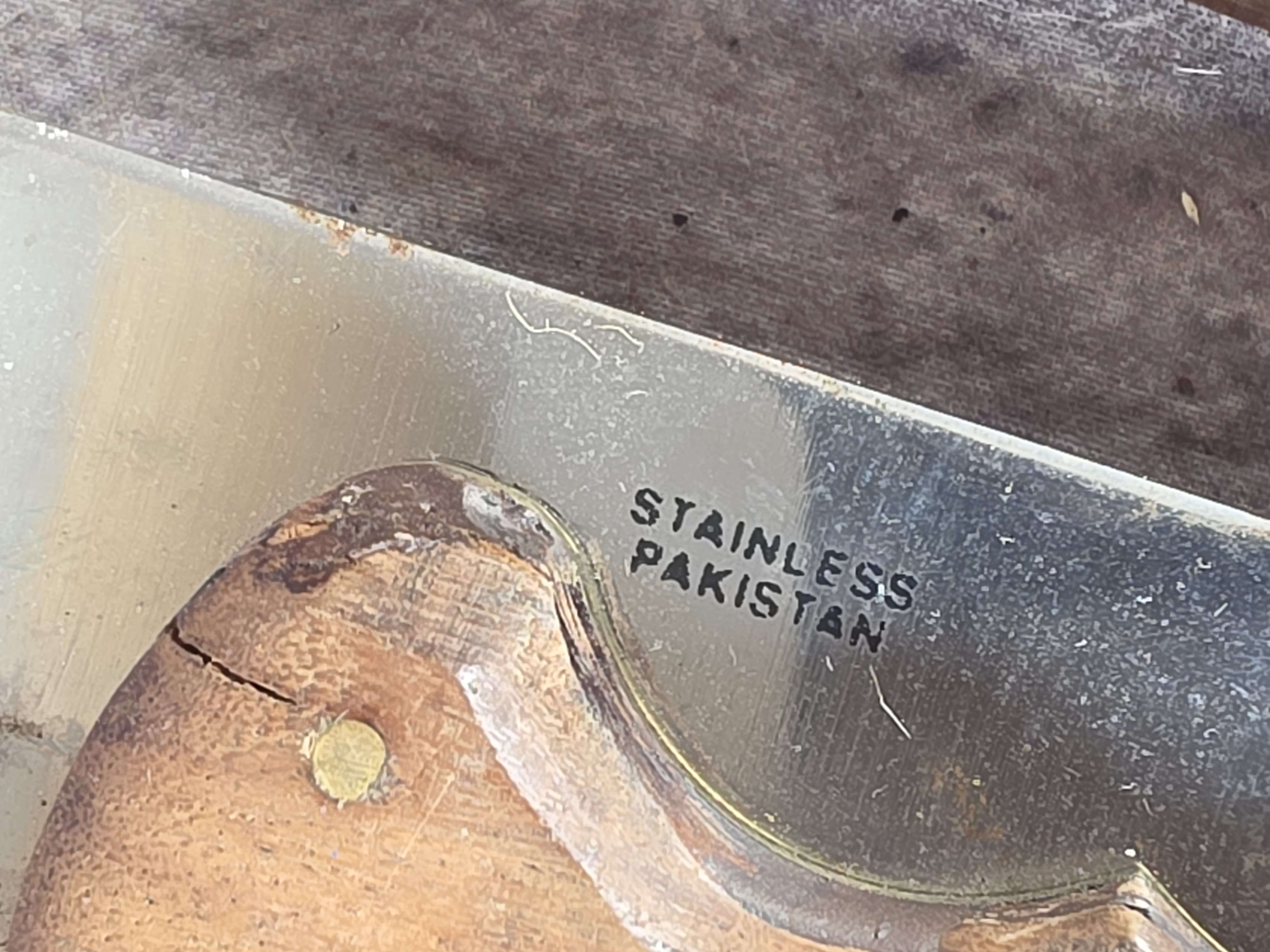 A Collection of Eight Oversized Folding and Fixed Blade Knives from Pakistan and China