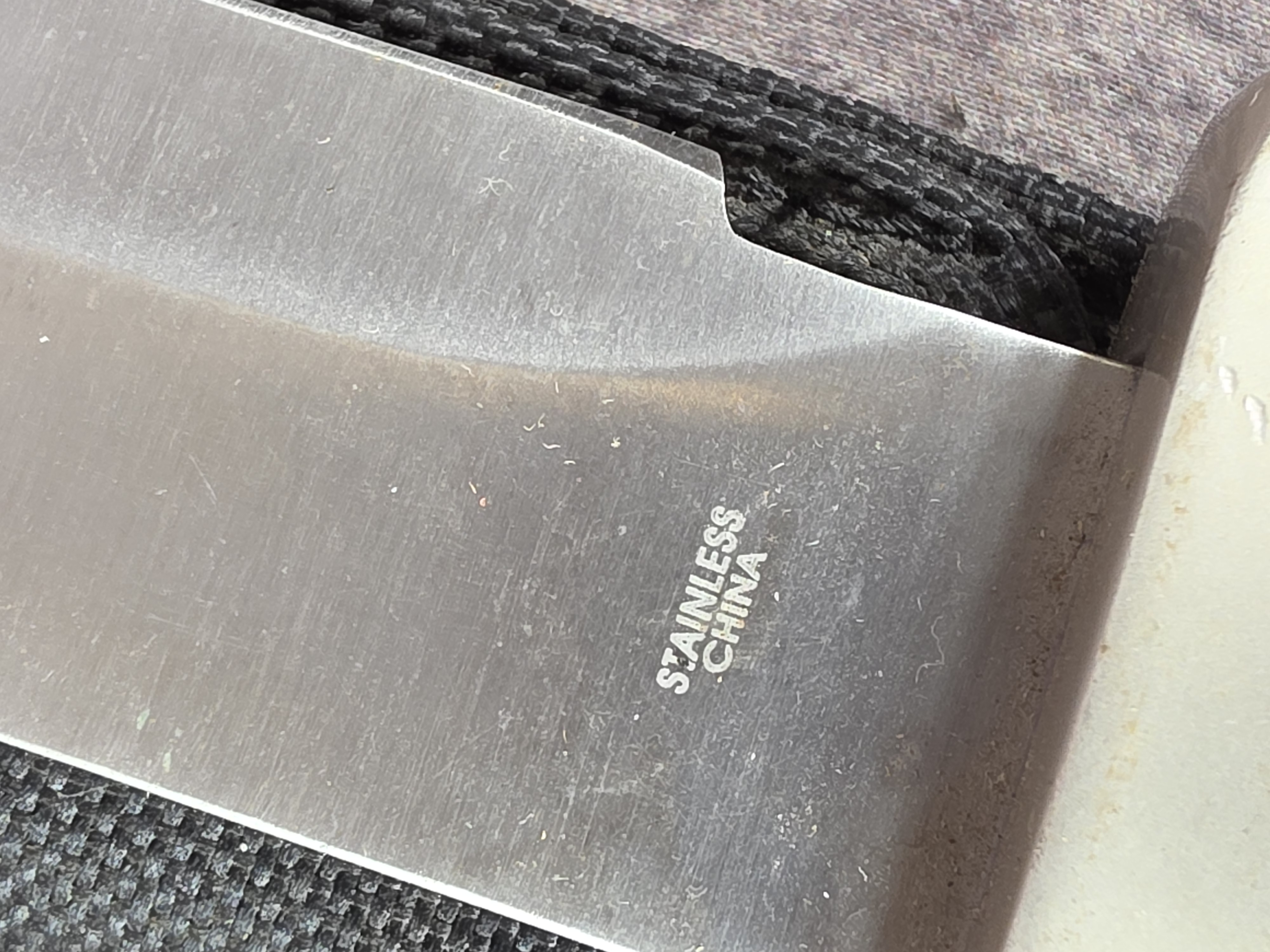 A Collection of Eight Oversized Folding and Fixed Blade Knives from Pakistan and China