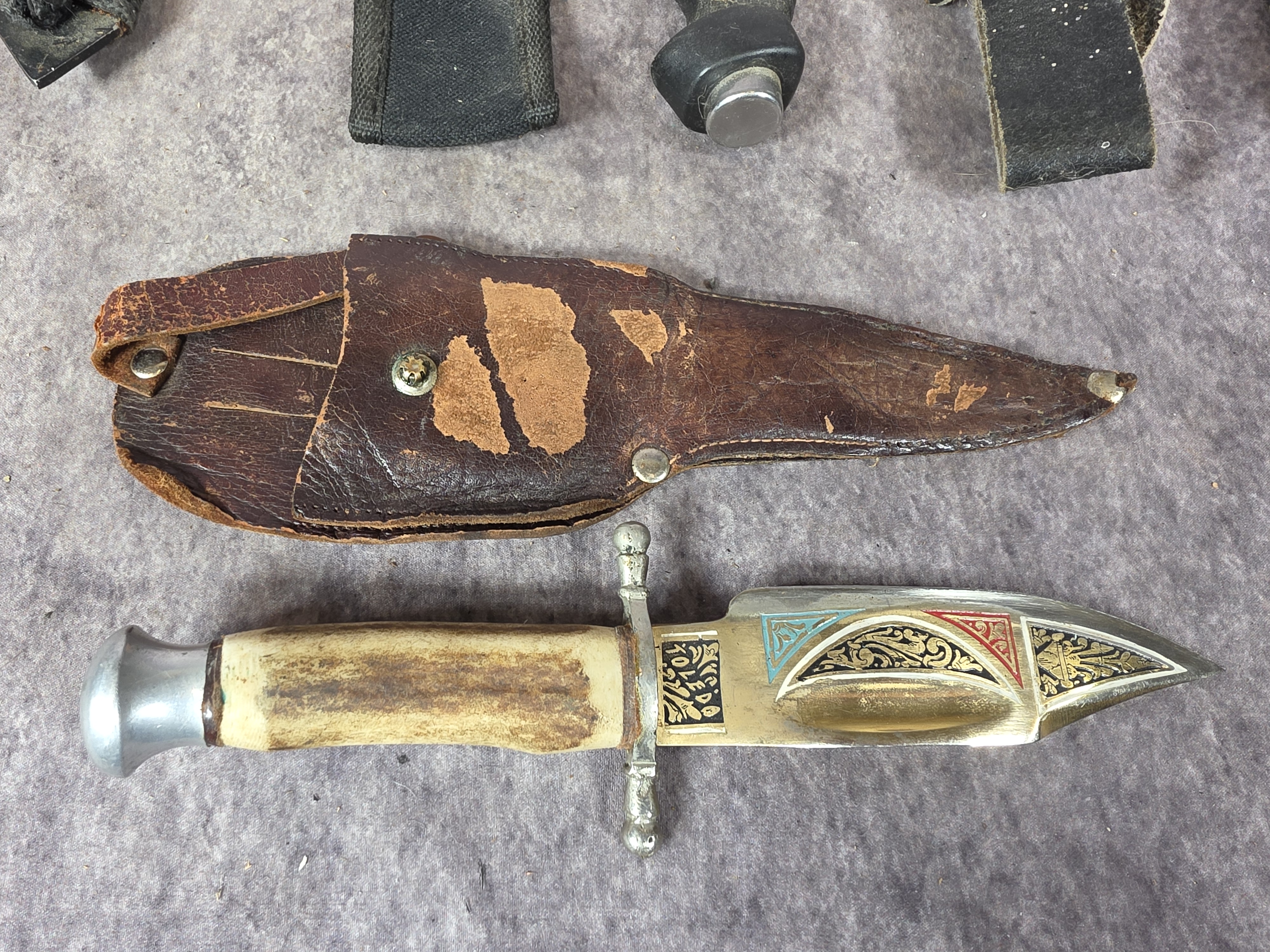 A Collection of Fixed Blade Hunting, Survival, and Decorative Knives
