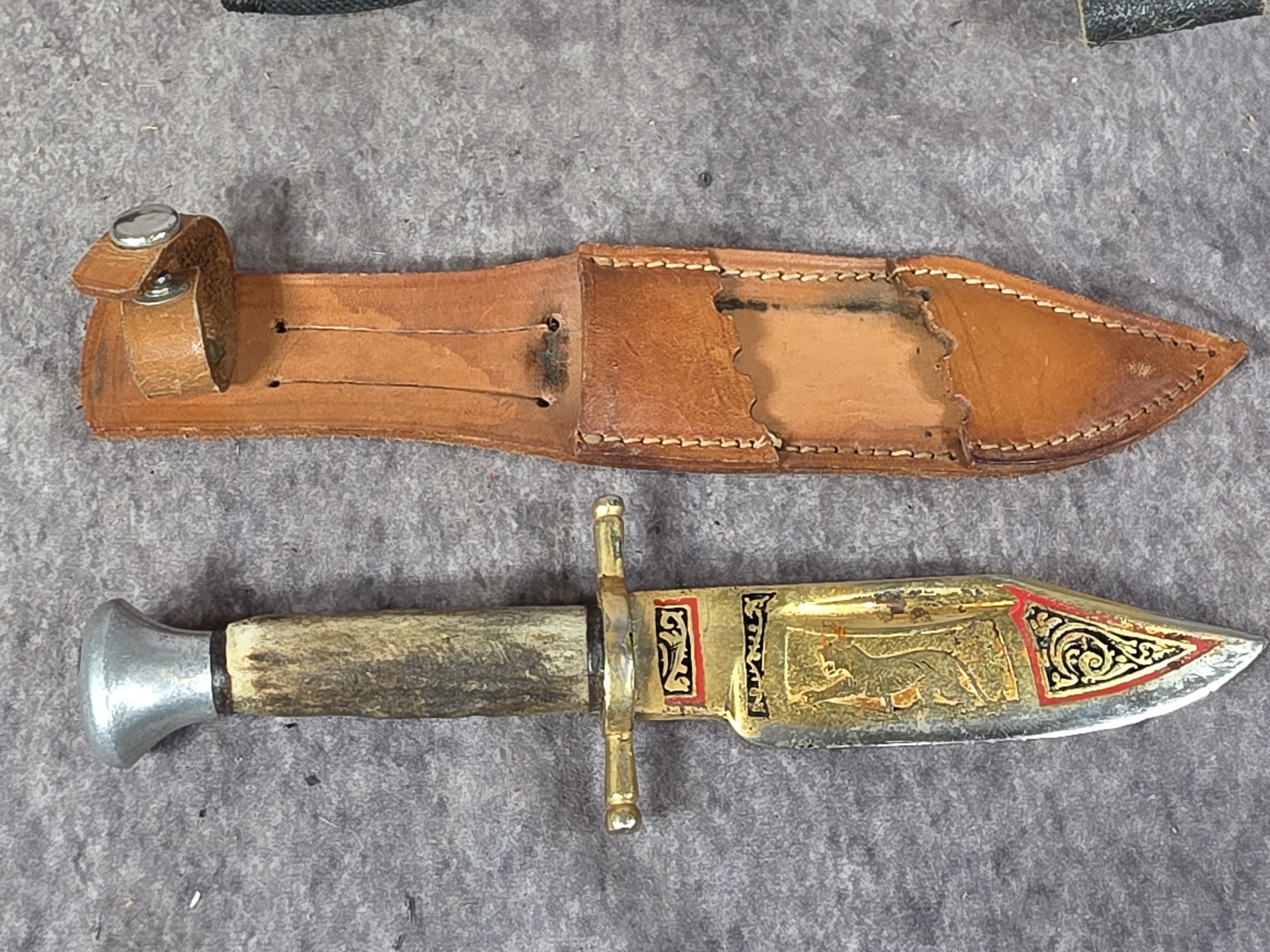 A Collection of Fixed Blade Hunting, Survival, and Decorative Knives