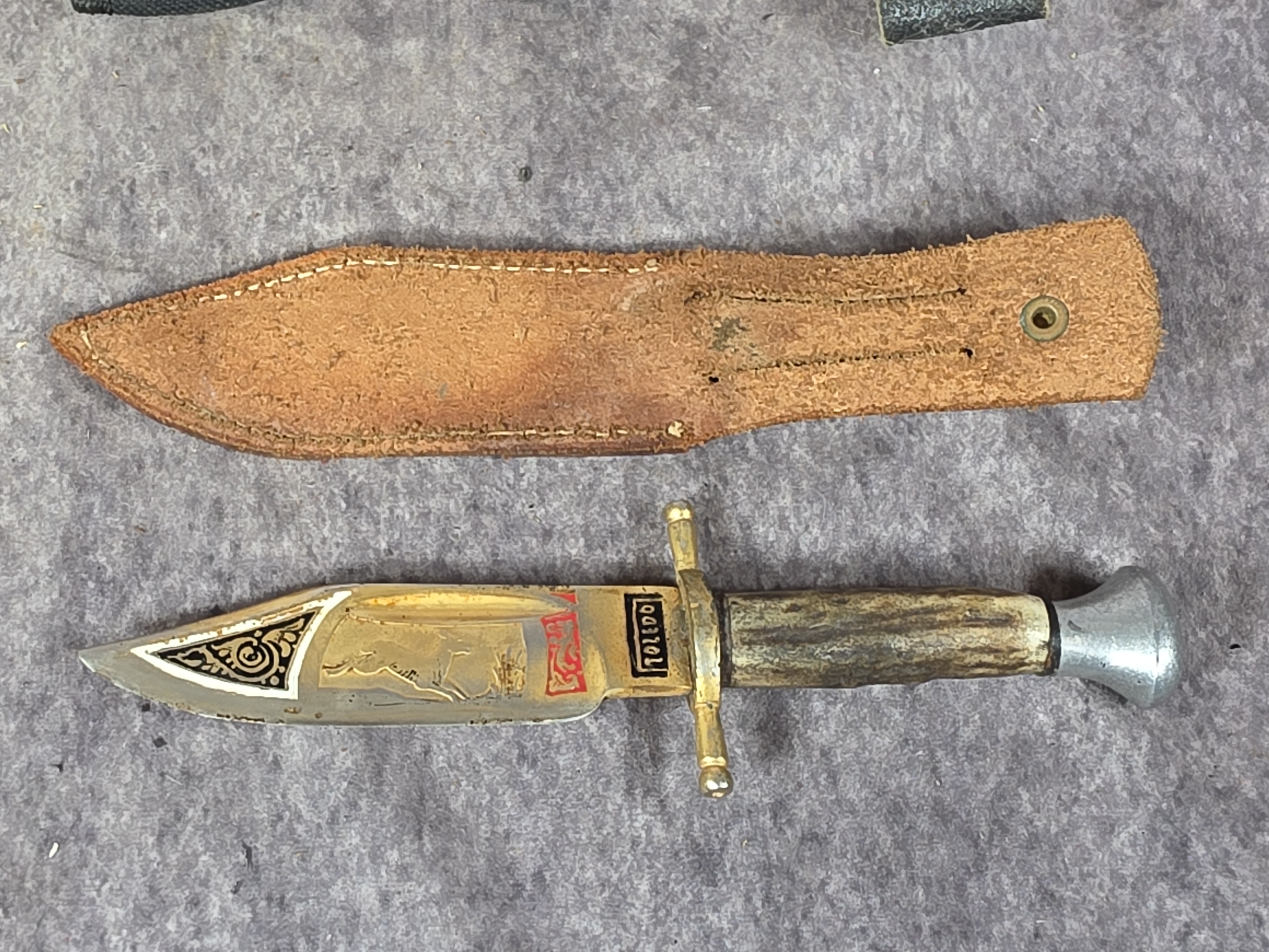 A Collection of Fixed Blade Hunting, Survival, and Decorative Knives