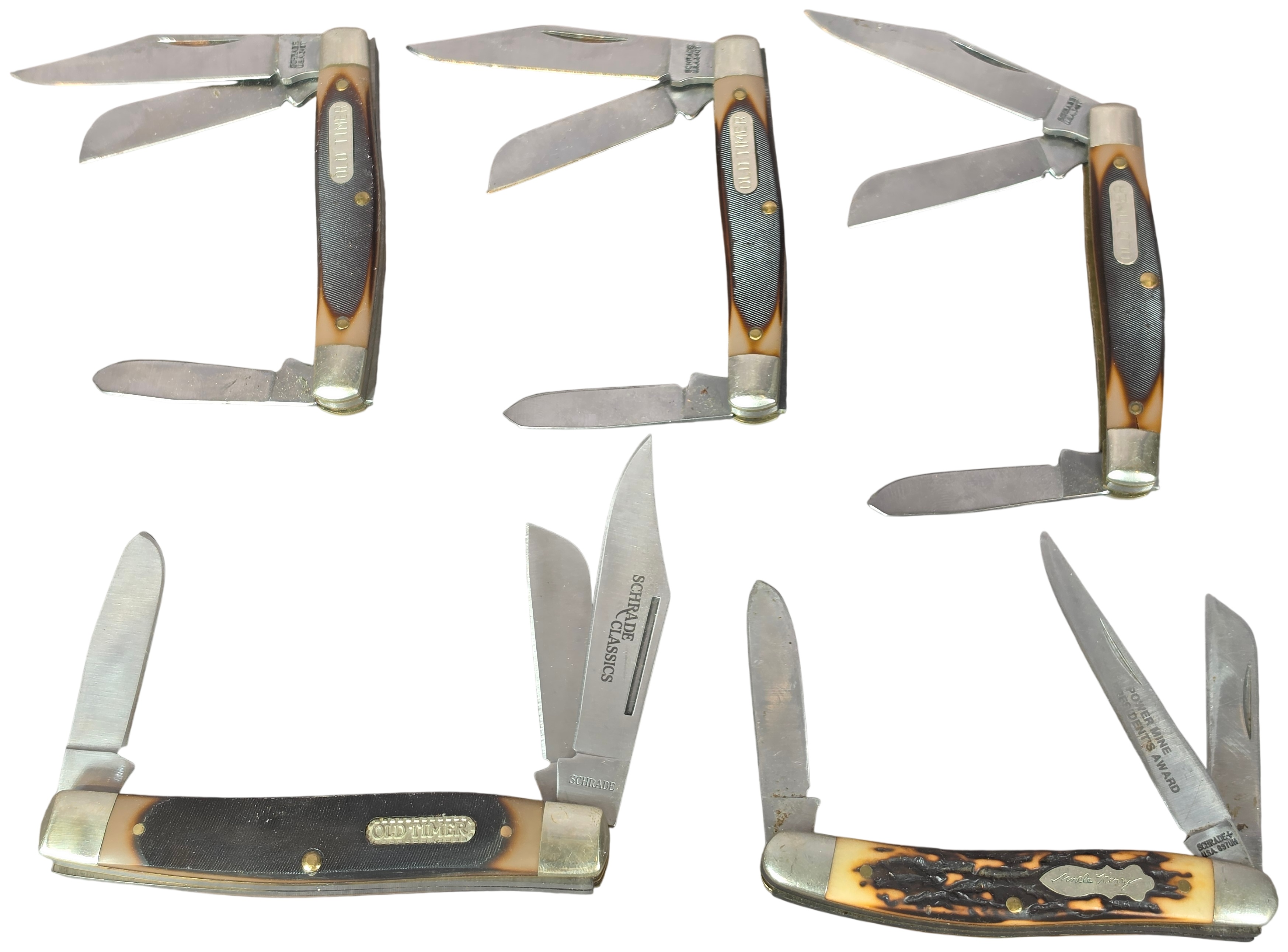 A Collection of Five Schrade Old Timer and Uncle Henry Pocket Knives