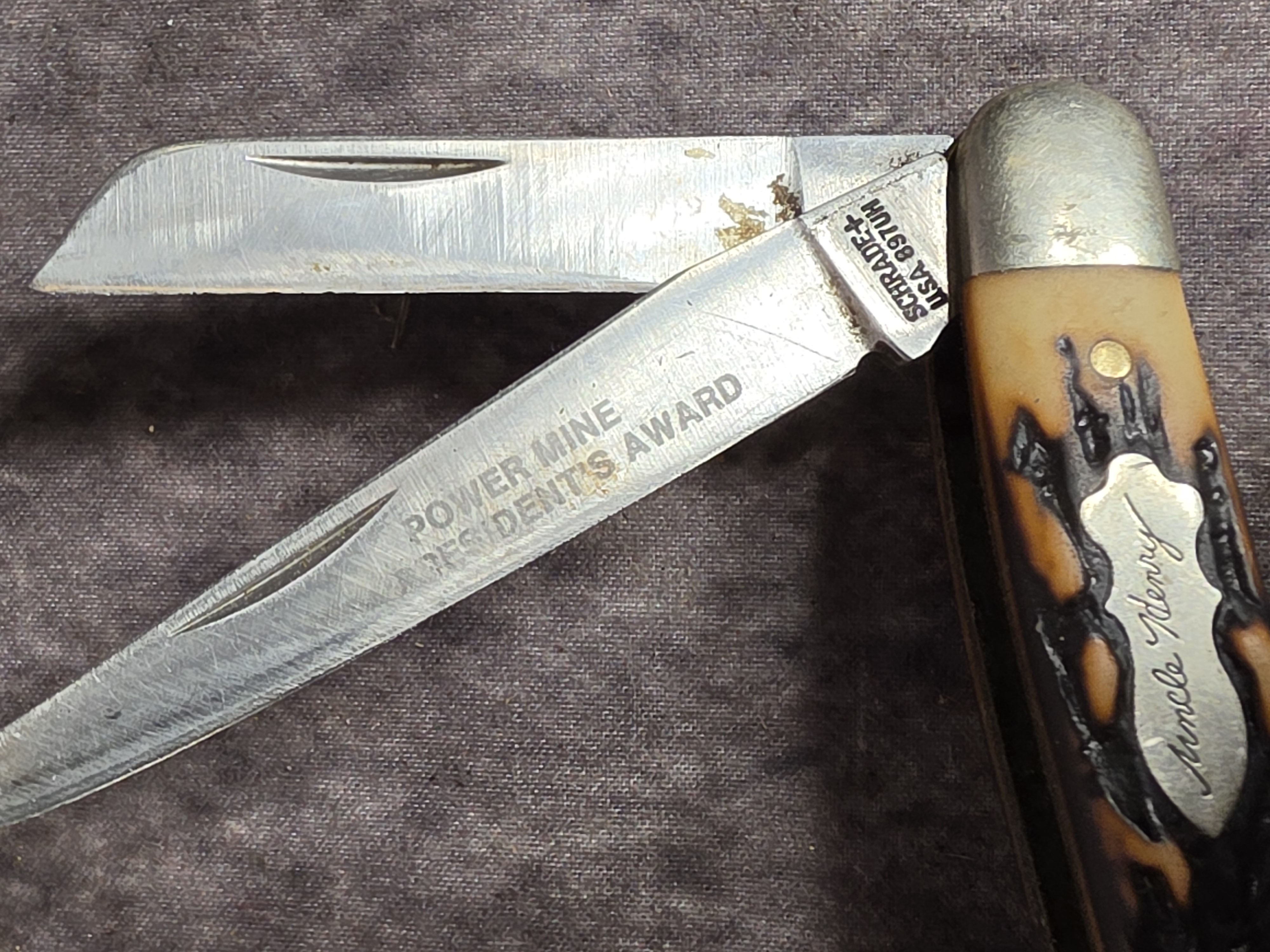 A Collection of Five Schrade Old Timer and Uncle Henry Pocket Knives