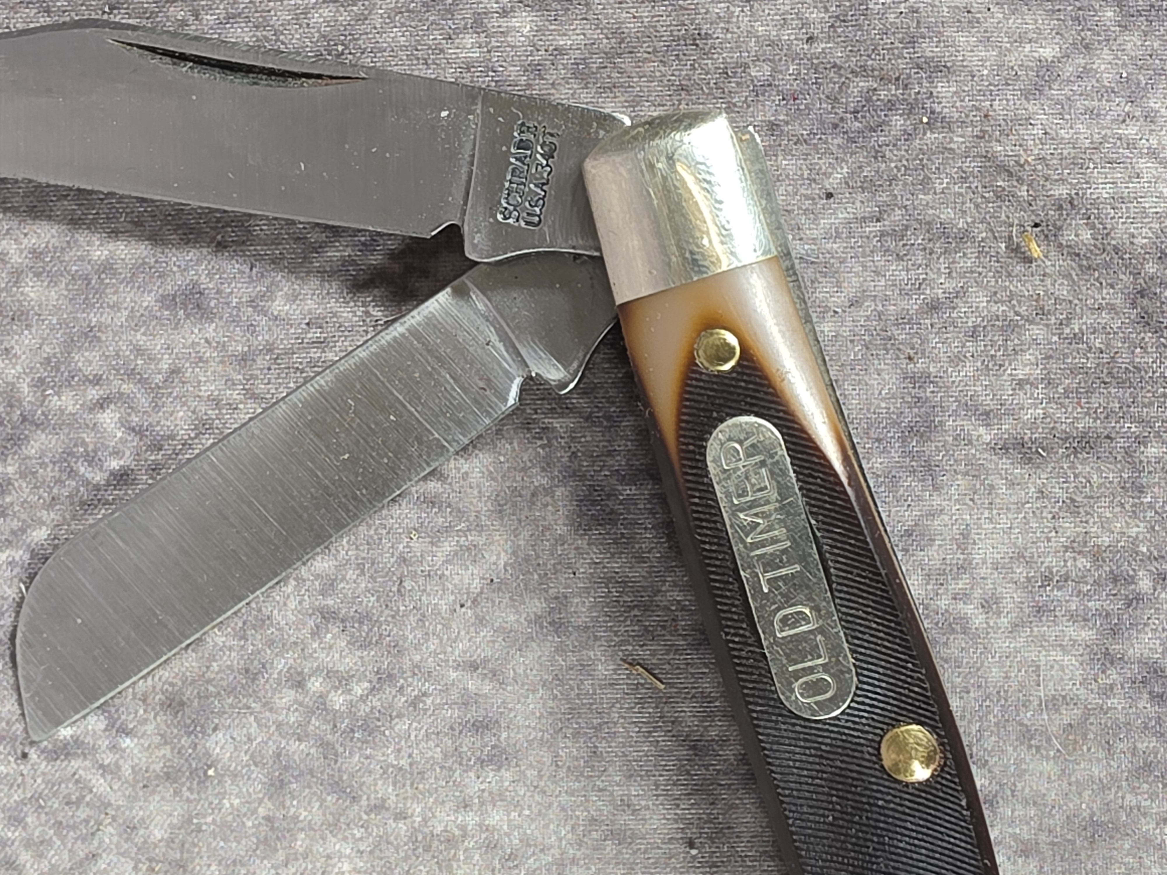 A Collection of Five Schrade Old Timer and Uncle Henry Pocket Knives