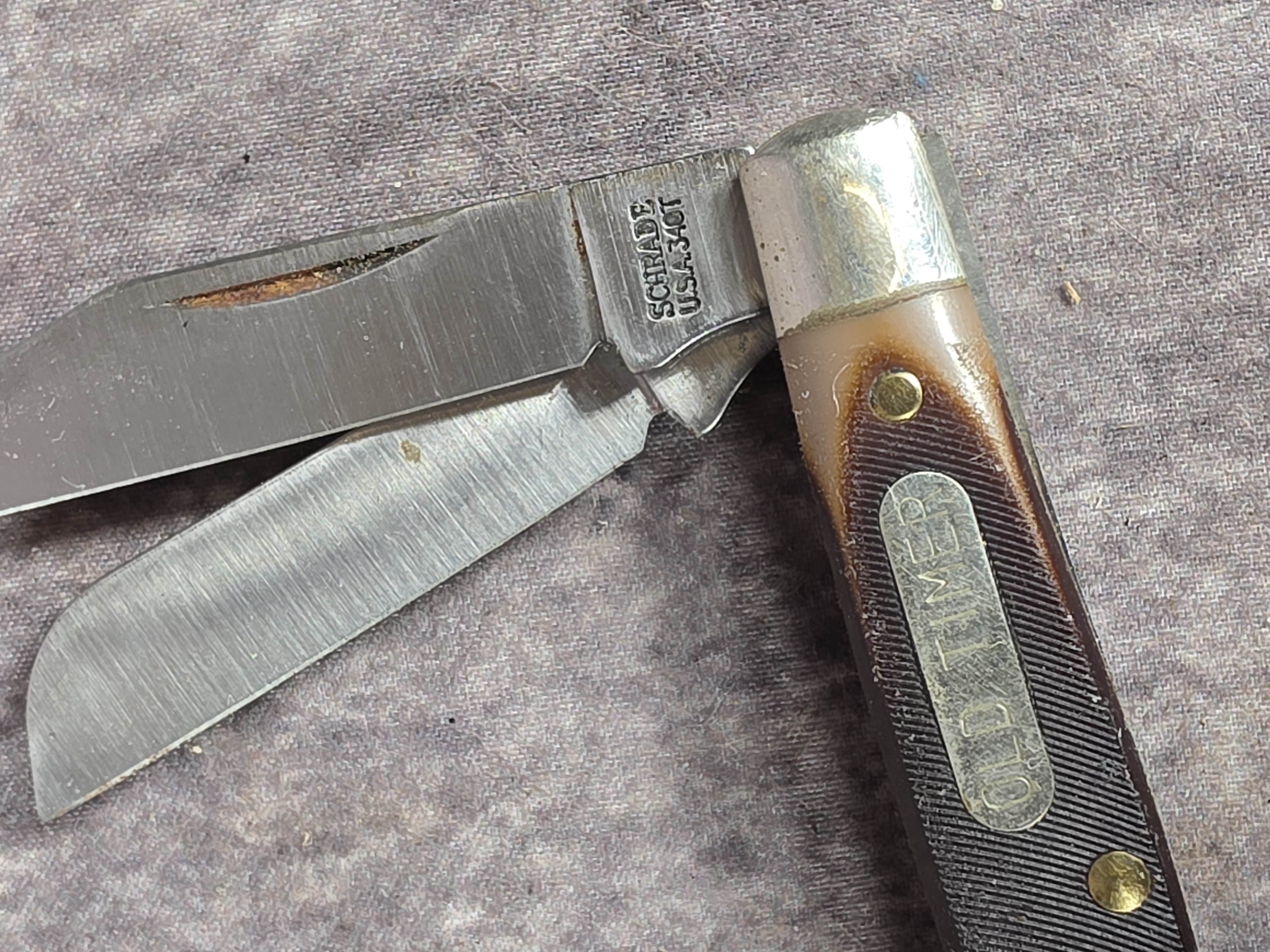 A Collection of Five Schrade Old Timer and Uncle Henry Pocket Knives