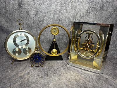 An Assortment of Vintage Bulova, Seiko, and Caravelle Table and Desk Clocks. Shipping is 