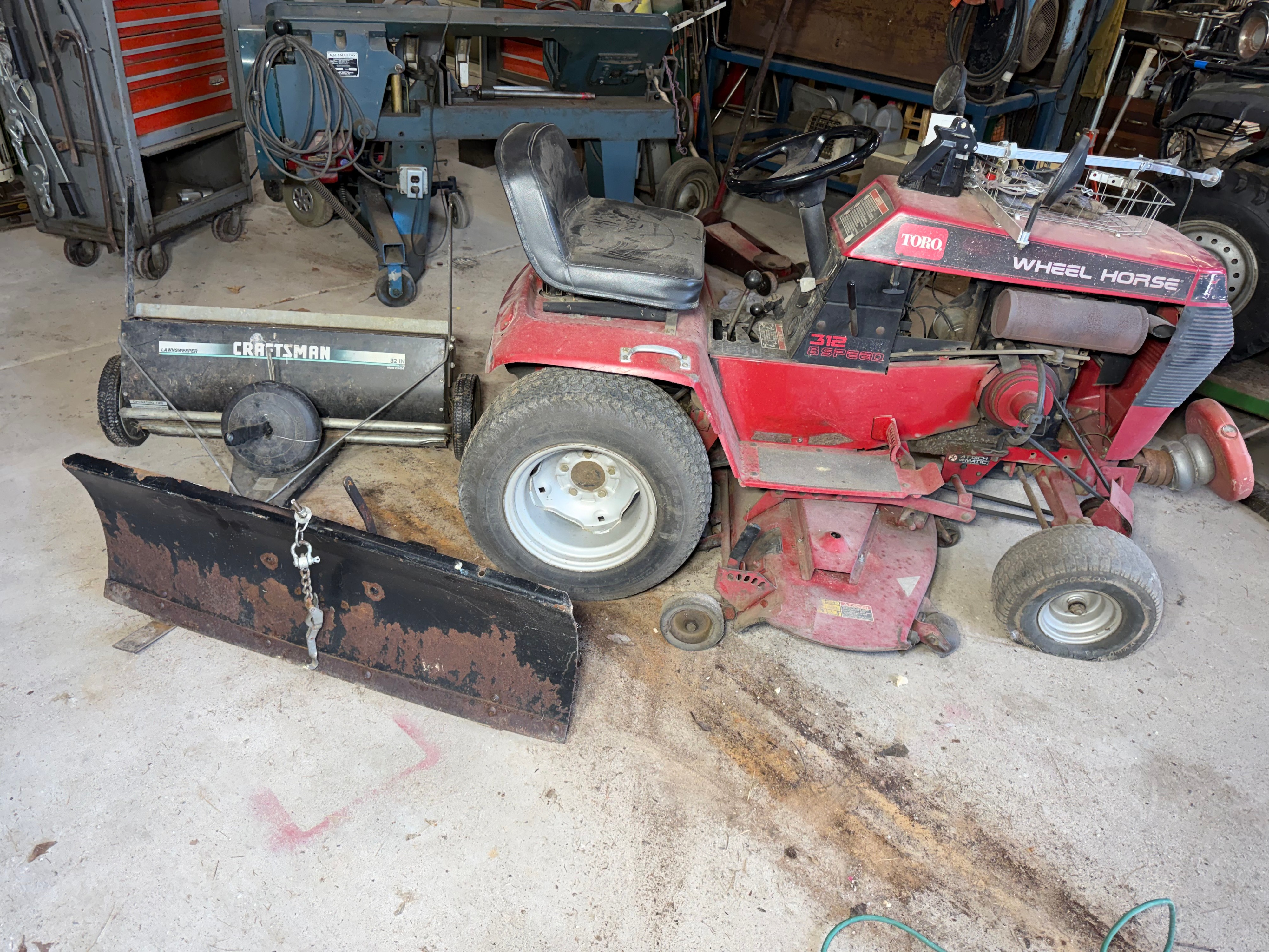 Toro Wheel Horse 312-8 Garden Tractor with Mid Mount Mower Deck Craftsman Snow Blade and Lawn Sweeper