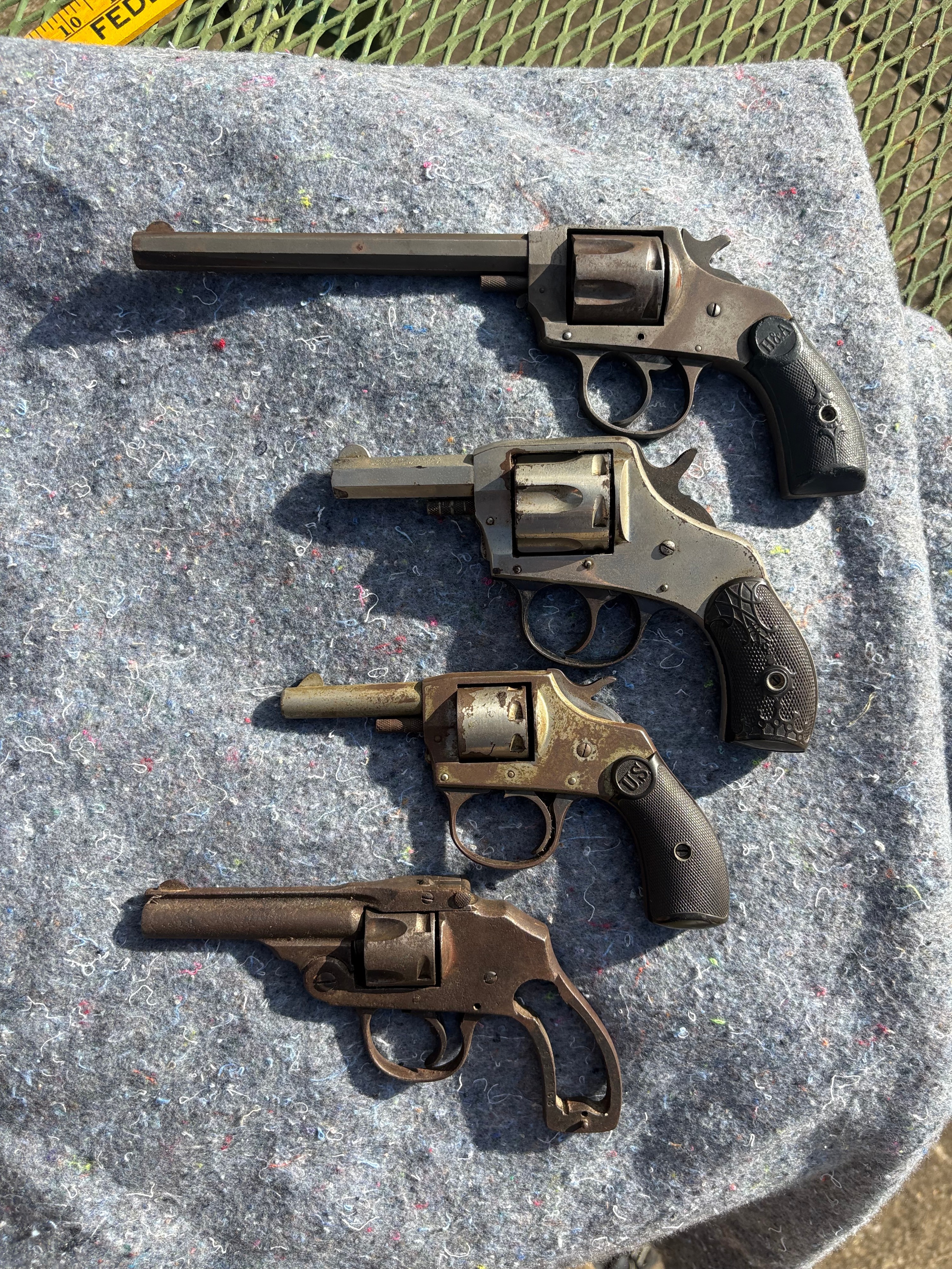 A Group of Four American Double Action Solid Frame Revolvers by Hopkins and Allen, Harrington and Richardson, and Iver Johnson .32 and .38 Caliber with 2.5 to 6 Inch Barrels