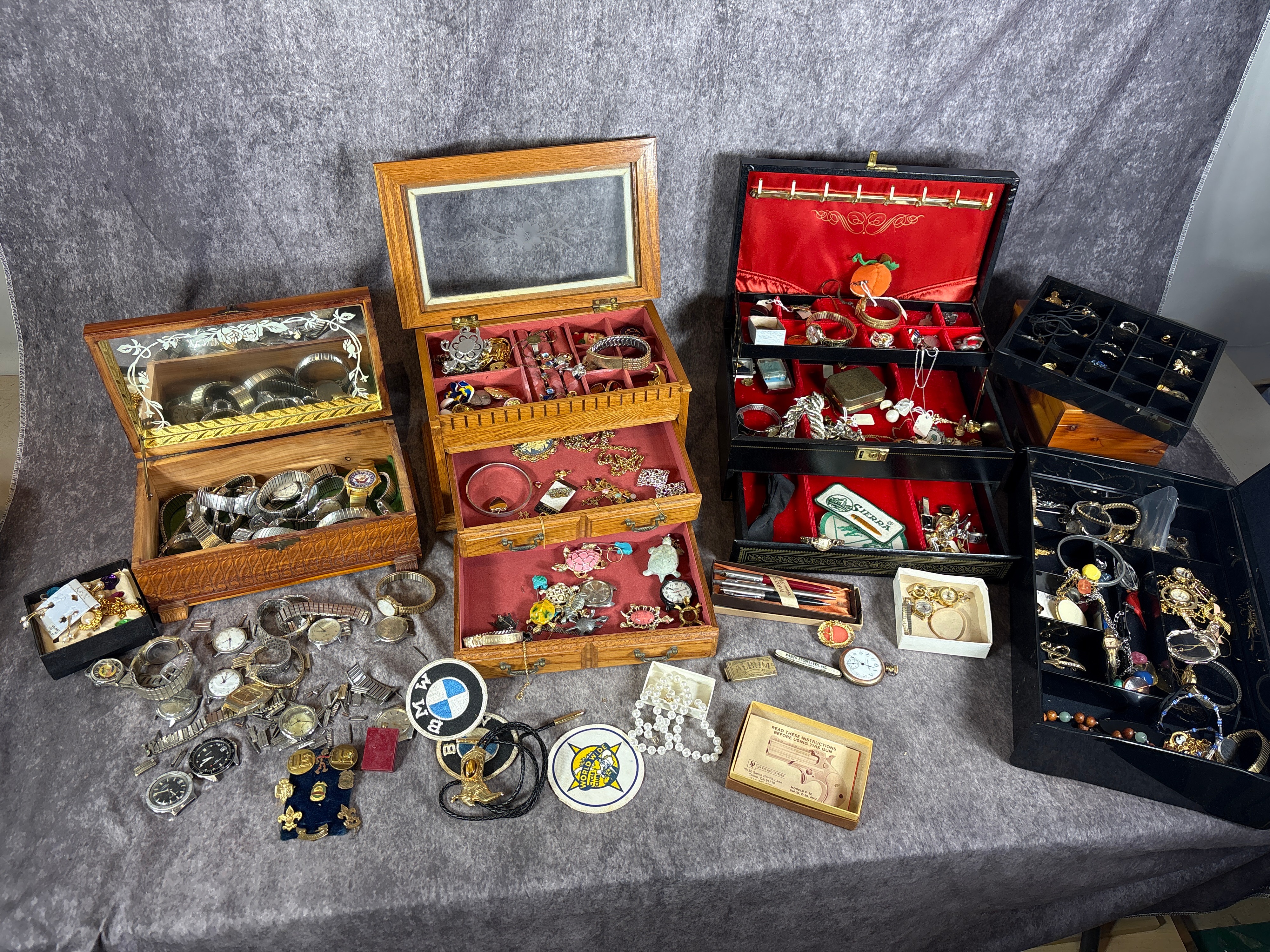An Assortment of Vintage Timex Watches, Estate Costume Jewelry, and Military Insignia