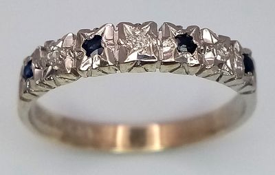 A 9K White Gold Sapphire and Diamond Ring. Size O/P. 2.1g total weight.