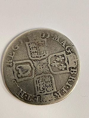 1711 QUEEN ANNE SILVER SHILLING. Condition worn/fair. Please see pictures.