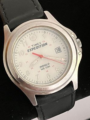 Vintage TIMEX EXPEDITION WRISTWATCH.Mid Size. Quartz Movement.Date Window.Red Second Hand.Black 