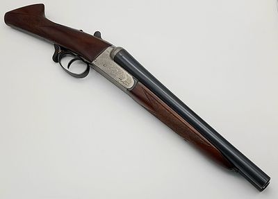A GUNMARK "KESTRAL" 12 GUAGE SAWN OFF SHOTGUN WITH SIDE BY SIDE BARRELS , COMES WITH A 