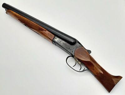 A BAIKAL 12 GUAGE SAWN OFF SHOTGUN , A SPECIAL SMALLER SIZE EASIER TO CONCEAL, COME WITH A 