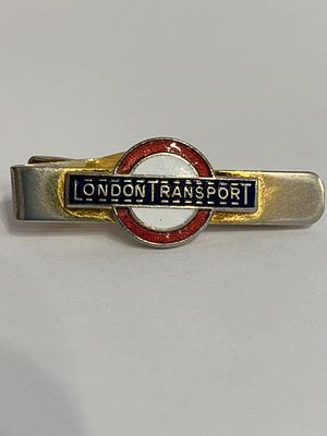 Vintage LONDON TRANSPORT TIE CLIP. Gold lettering on red, white and blue Enamel background. 