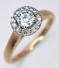 A 18K YELLOW GOLD DIAMOND HALO RING. 0.35CT TOTAL WITH A 0.24CT MAIN CENTRE ROUND BRILLIANT CUT Image - 1
