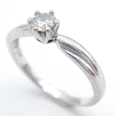 A PLATINUM DIAMOND SOLITAIRE RING - 0.21CT. 2.8G. SIZE K. SC - 1068.