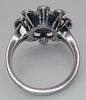 A 18K white gold diamond and sapphire fancy ring, 0.20ct diamond weight, 9x7mm cabochon Image - 3