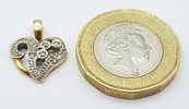 A 9K YELLOW GOLD DIAMOND SET HEART PENDANT / CHARM. 1.1G. 18MM.Image - 4