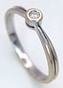 AN 18K GOLD, TWO COLOUR DIAMOND SOLITAIRE RING. 1.9G. SIZE N. SC - 1076.Image - 2