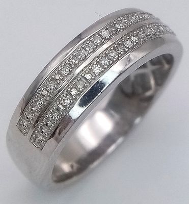 A 9K white gold diamond double row ring, 0.18ct diamond weight, 5.9g total weight, ring size S.