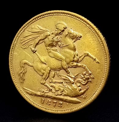 An 1872 Queen Victoria, Young Bun Head, 22K Gold Full Sovereign Coin. EF grade but please see