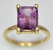 An 18k yellow gold diamond and amethyst ring. 0.1ct diamond. 2.25ct amethyst. 3.5g total Image - 1