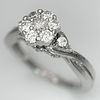 A 9k white gold, diamond cluster ring, 0.20ct diamond, 3.1g total weight, size J. 2613H.Image - 2