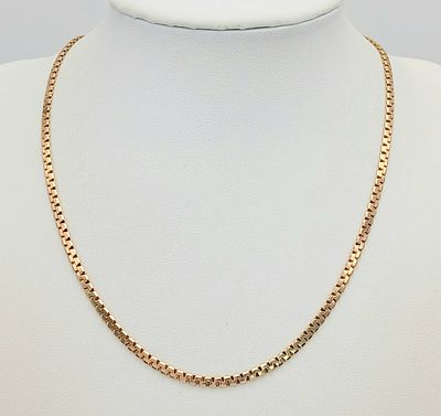 A 9K yellow gold flat banana chain necklace, 9.7g total weight, 16” total length. Ref: 1784I