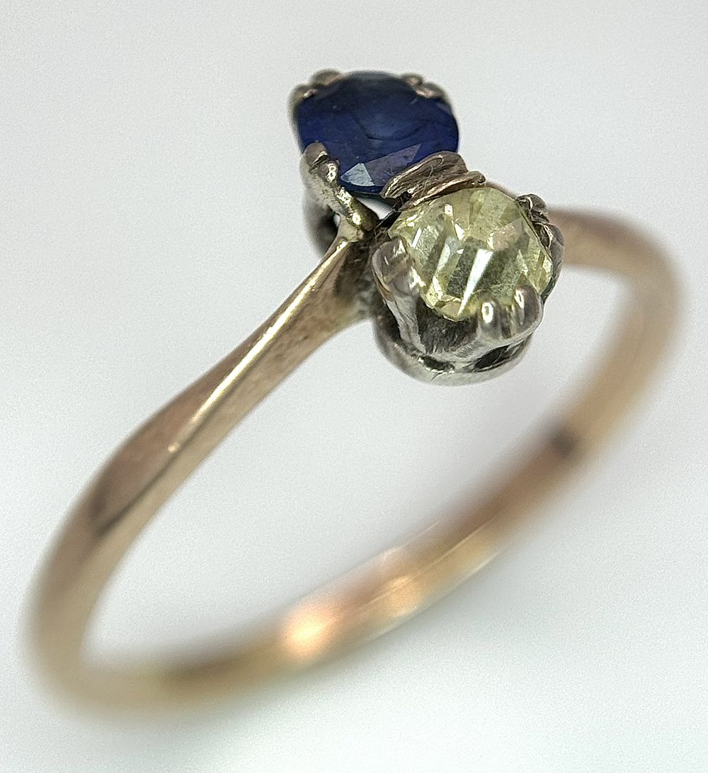 A 18K yellow gold diamond and sapphire ring, 0.25ct diamond weight, 0.24ct sapphire weight 