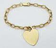 A 9K yellow gold heart charm bracelet, approx 18.5cm in length, 12.7g total weight. Ref: 1960IImage - 1