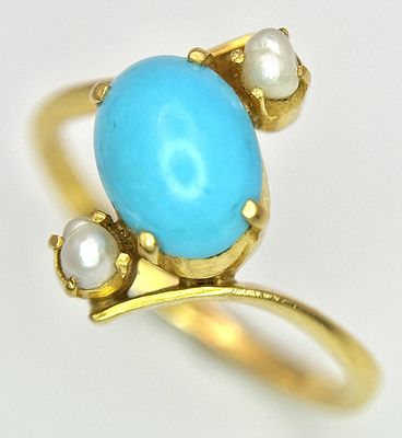 An 18k yellow gold turquoise and pearl ring. 8x6mm turquoise cabochon, 3.3g total weight, size