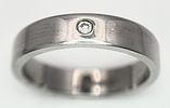 A 9k white gold diamond wedding band. 7.3g total weight, size U. CW01.Image - 1