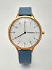 A Skagen Quartz Ladies Watch. Blue leather strap. Gilded case - 37mm. Mother of Pearl Dial. In Image - 1