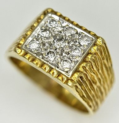 AN 18K YELLOW GOLD DIAMOND SET SIGNET RING. 0.30CTW. 7.9G. SIZE Q. SC-4099.