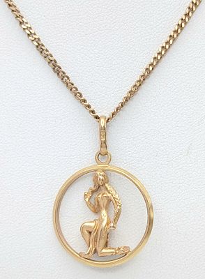 A 9K GOLD CIRCULAR VIRGO PENDANT ON A 62cms HERRINGBONE NECKLACE CHAIN . 11.2gms