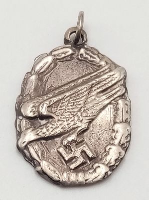 WW2 German .800 Silver Fallschirmjäger “Loyalty for Loyalty” Pendant. The German paratrooper